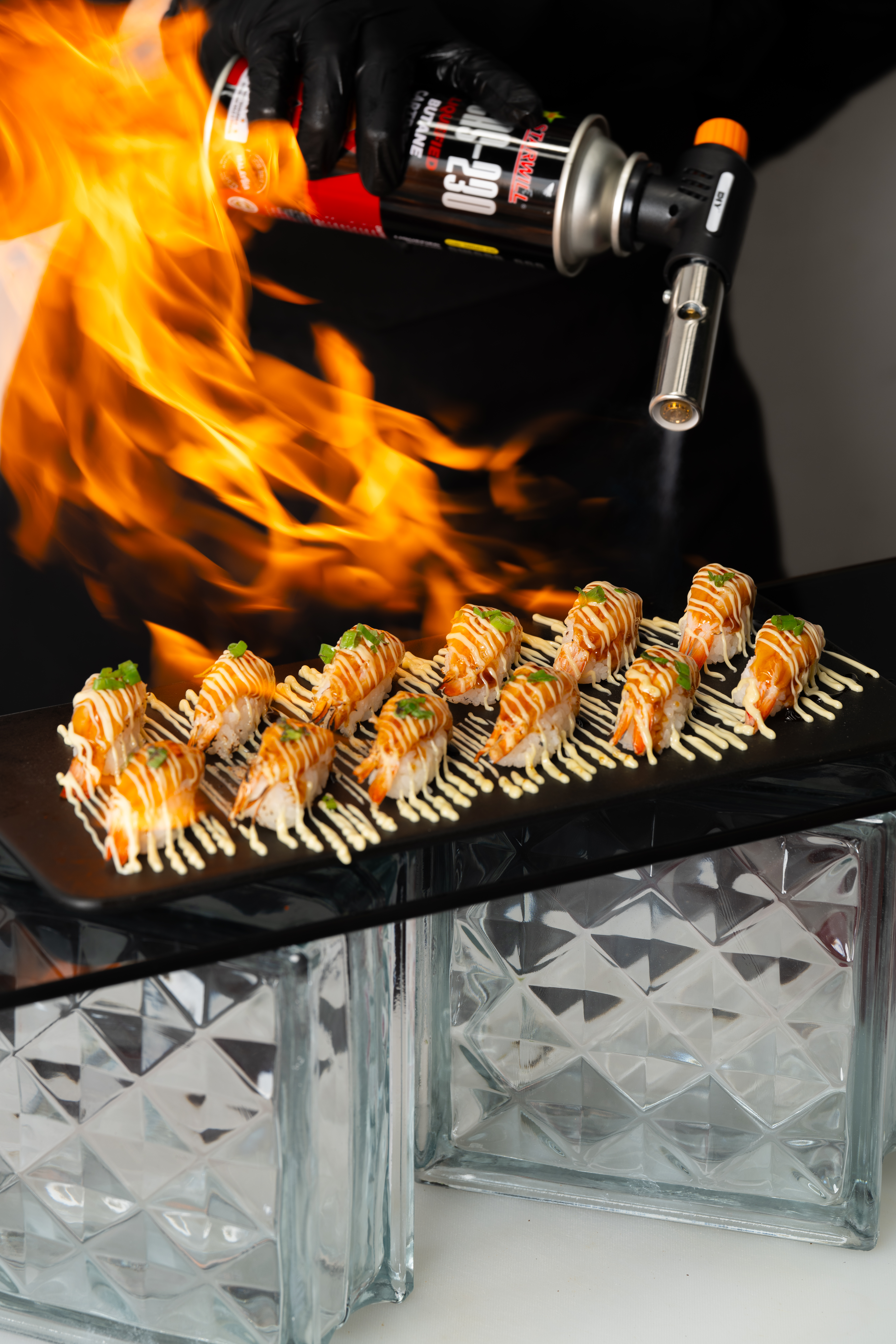 sushi plus live tossing sushi salmon mentai