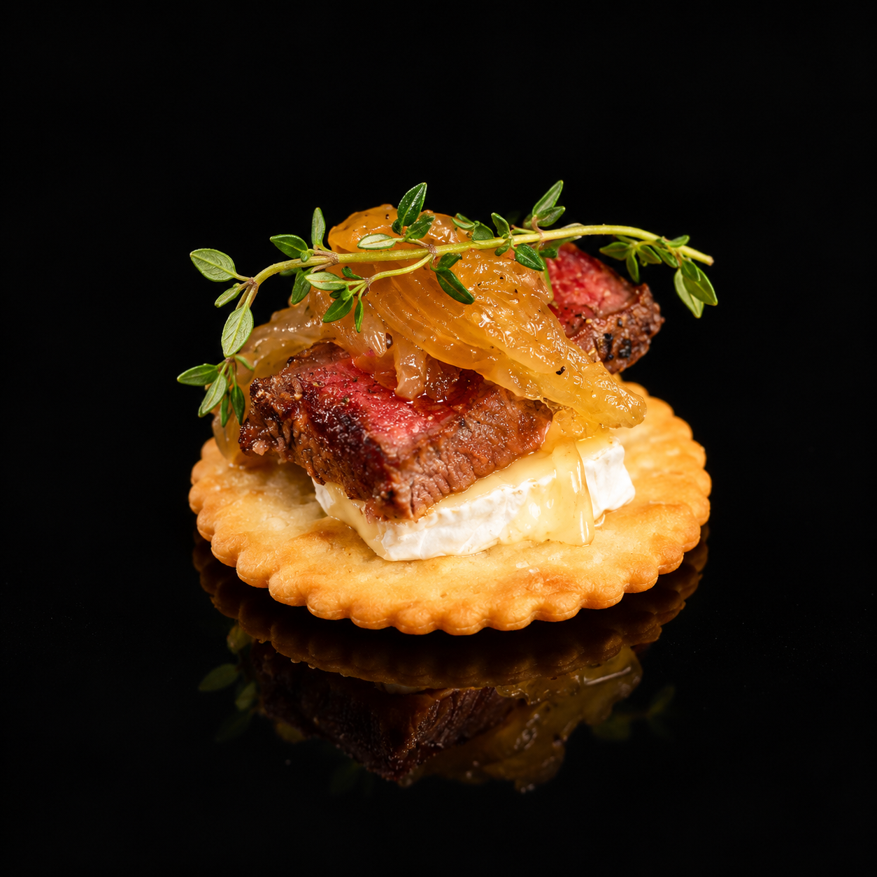 steak and brie on cracker canape dishes