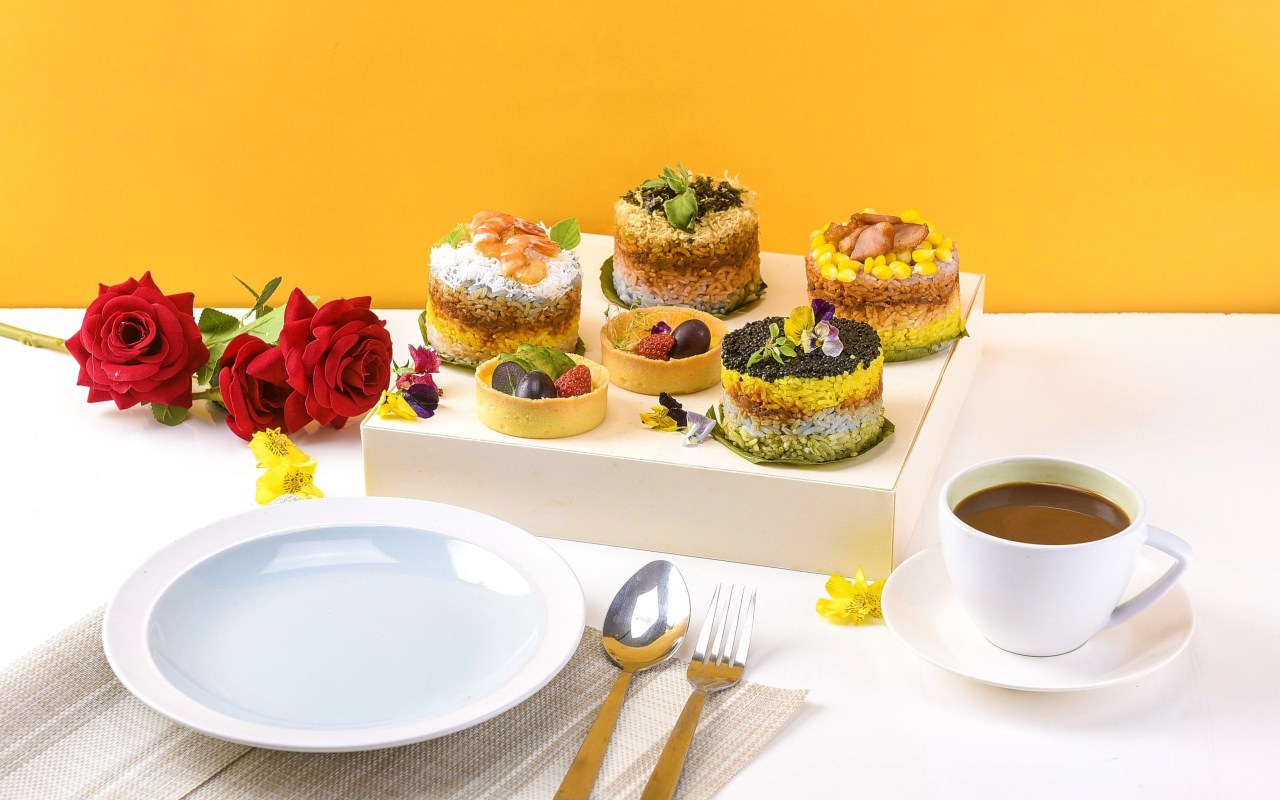 Nasi lemak cake with Avruga Caviar, Sambal Shrimp, Pan-Fried Salmon, and Pan-Fried Smoke Duck