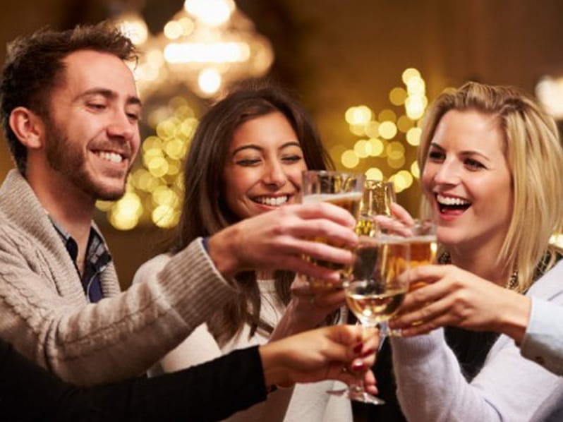 colleagues celebrating achievements at party